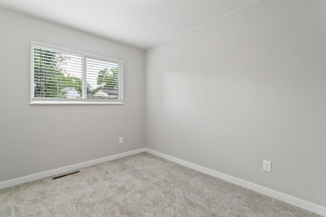 Building Photo - Freshly Renovated 4-Bedroom Home with Over...