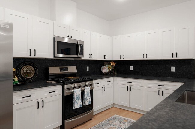 Building Photo - 3 BEDROOM DUPLEXES IN CHAFFEE CROSSING!