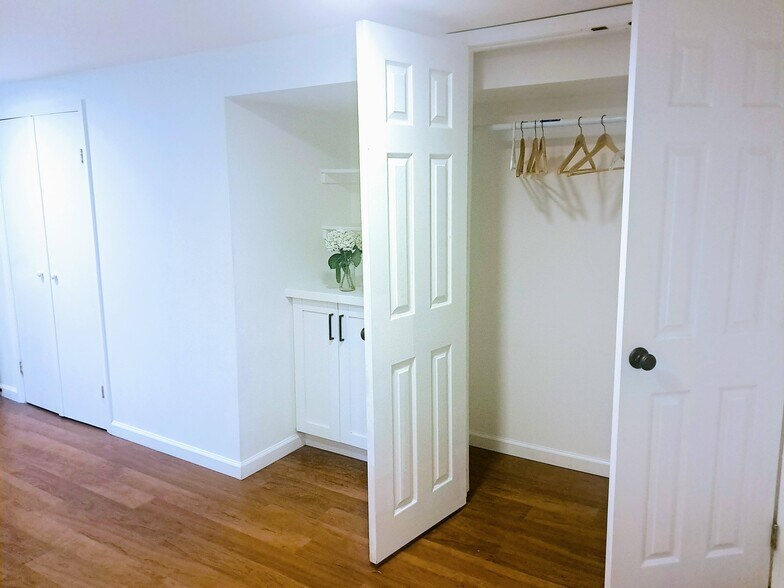 Bedroom closet and built-in bookcase - 9918 Tenbrook Dr
