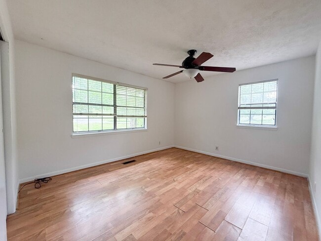 Building Photo - 2-Bedroom Home with Bonus Room & Large Wooden Deck | Pet-Friendly Near I-40 & City Lake