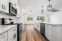 Building Photo - 6670 SW 13th Ln