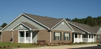 Building Photo - Village at Wedgewood Senior Apartments 55+