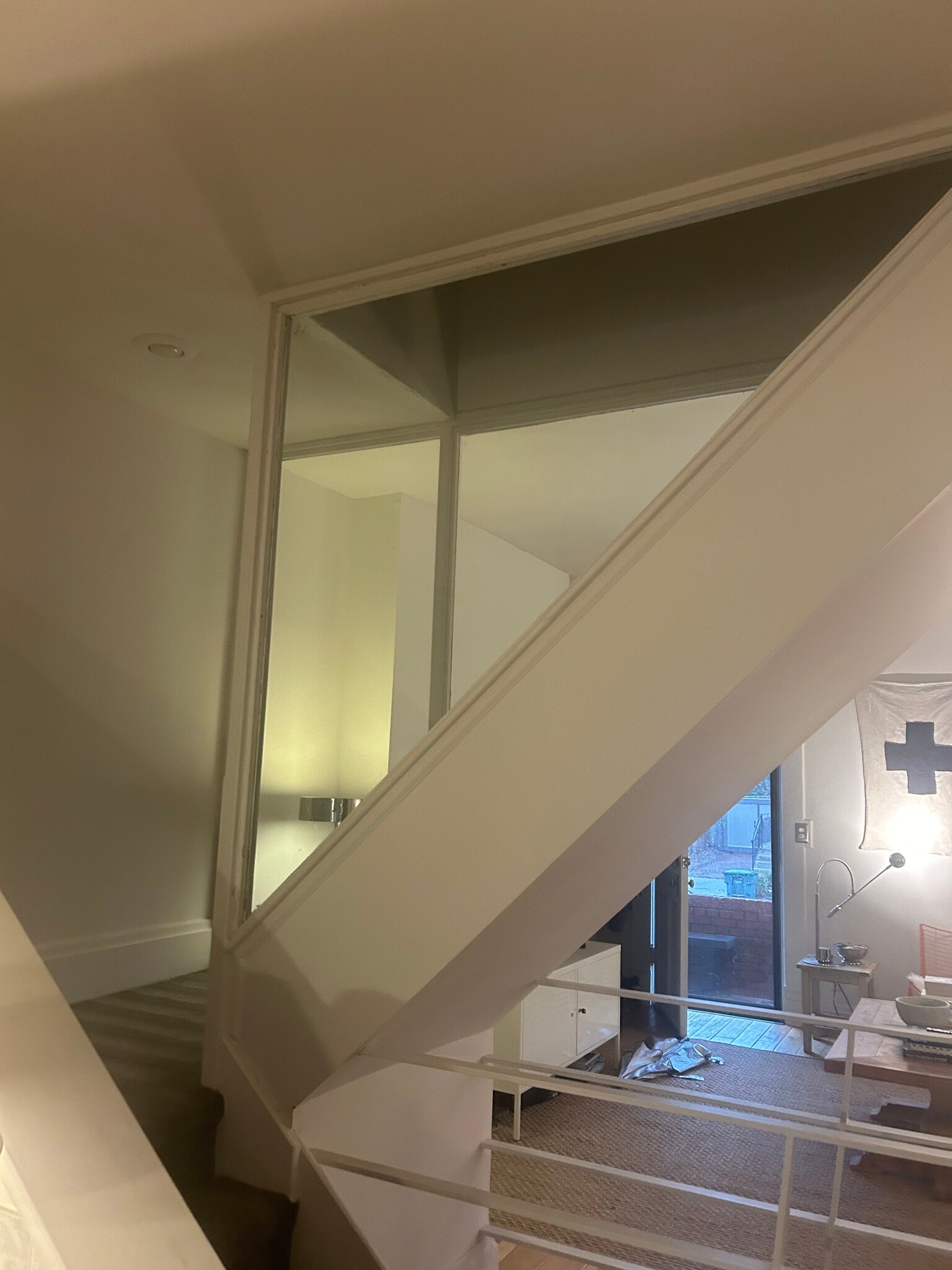 Staircase with glass walls - 181 E Kossuth St