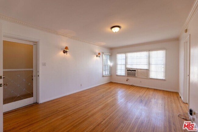 Building Photo - 8539 1/2 Cashio St