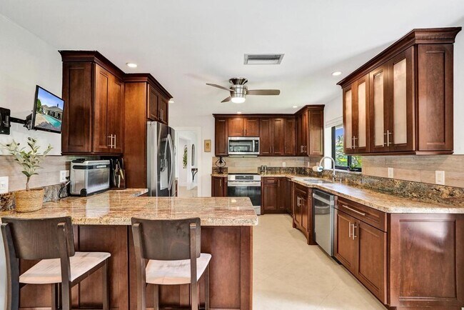 Building Photo - Boca Raton Beautifully Updated 4 Bedroom Pool Home