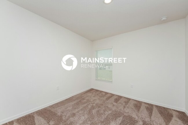 Building Photo - 4 Bedroom Pet-Friendly Home in Mascotte, FL with Main Street Renewal