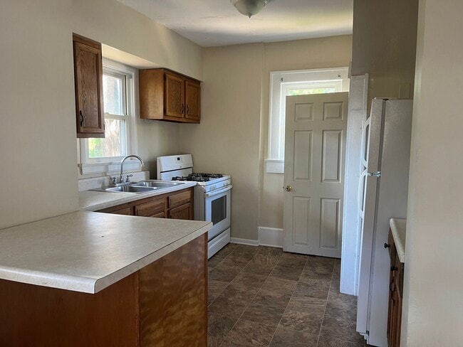 Building Photo - Bright, Spacious & Central — Minutes to Ma...