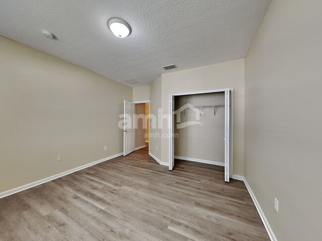 Building Photo - 7117 Rapid River Dr W