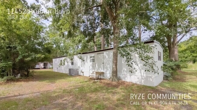 Building Photo - 11452 Hobart Blvd