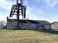 Building Photo - Move-in ready!! Bonus room that could easily be utilized as a 3rd bedroom!!