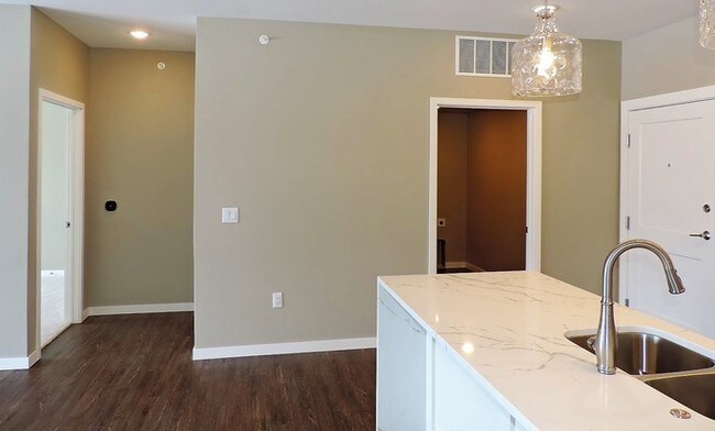 Building Photo - LUXURY CONDO - AVAILABLE NOW - MOVE IN PROMO