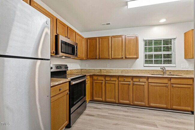 Building Photo - Earn Wealth While Leasing - Like a Homeown...