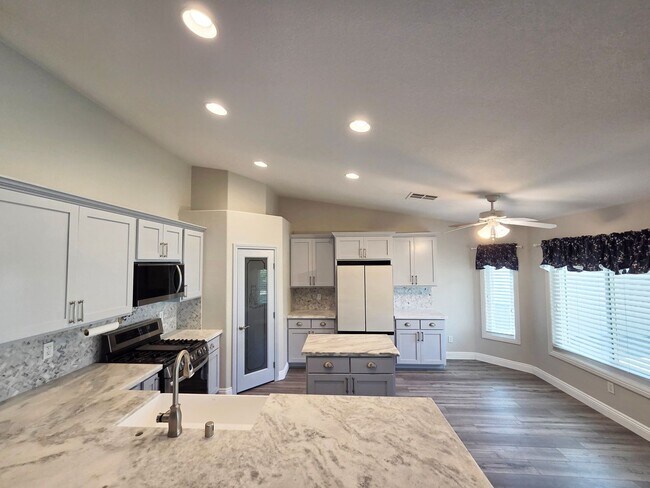 Building Photo - Gated Single-Story Home with Heated Pool, RV Parking & 3-Car Garage