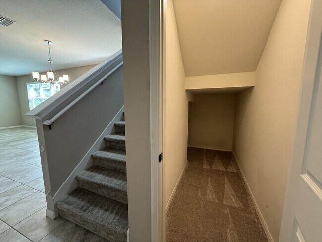 Building Photo - Spacious 4-Bedroom Retreat with additional office/den in the Heart of Trinity!