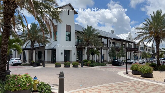 Building Photo - EXCEPTIONAL AND SPACIOUS FURNISHED TOWNHOME WITHIN WATERSIDE- NAUTIQUE!