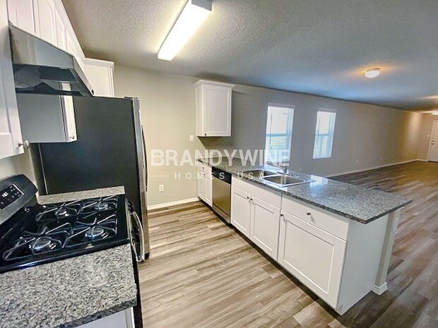 Building Photo - 7018 Winding Shelf