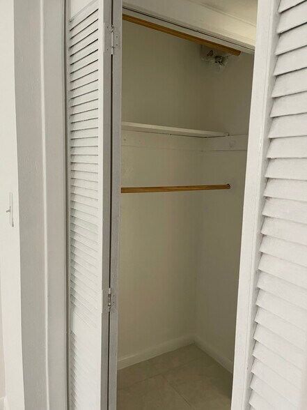 Bedroom closet left - 186 NW 4th Ave