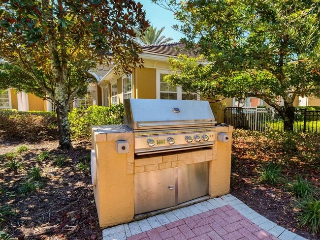 Building Photo - IMMACULATE 2nd Story condominium with so m...