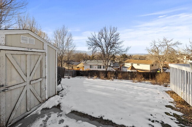 Building Photo - Spacious Split-Level Home with Beautiful Kitchen, Large Deck, and Fully Fenced Yard