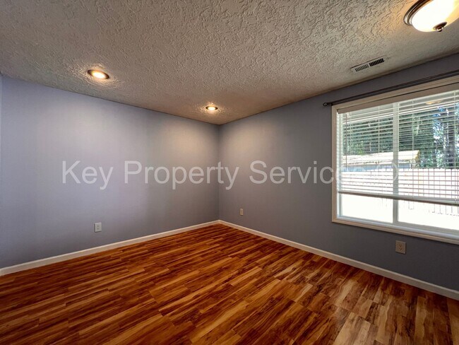 Building Photo - Orchards Ranch with Large Fenced Yard - Re...