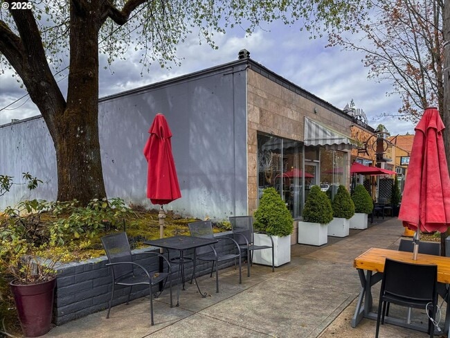 Building Photo - Main Street Living with Granite Kitchen, Gas Fireplace, and MAX Line Access