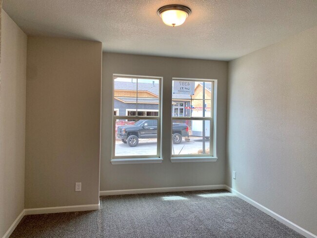 Building Photo - Main-Floor Living Meets Modern Comfort in Enclaves at Mountain Vista