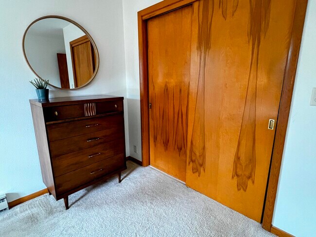 Plenty of storage is available in the dresser and closet. - 228 W Lexington Blvd