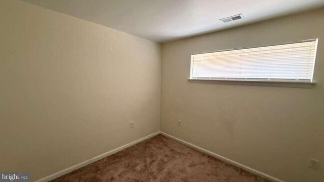 Building Photo - 8103 Greenspring Way