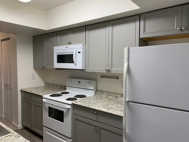 Building Photo - 2201 E 66th Ave