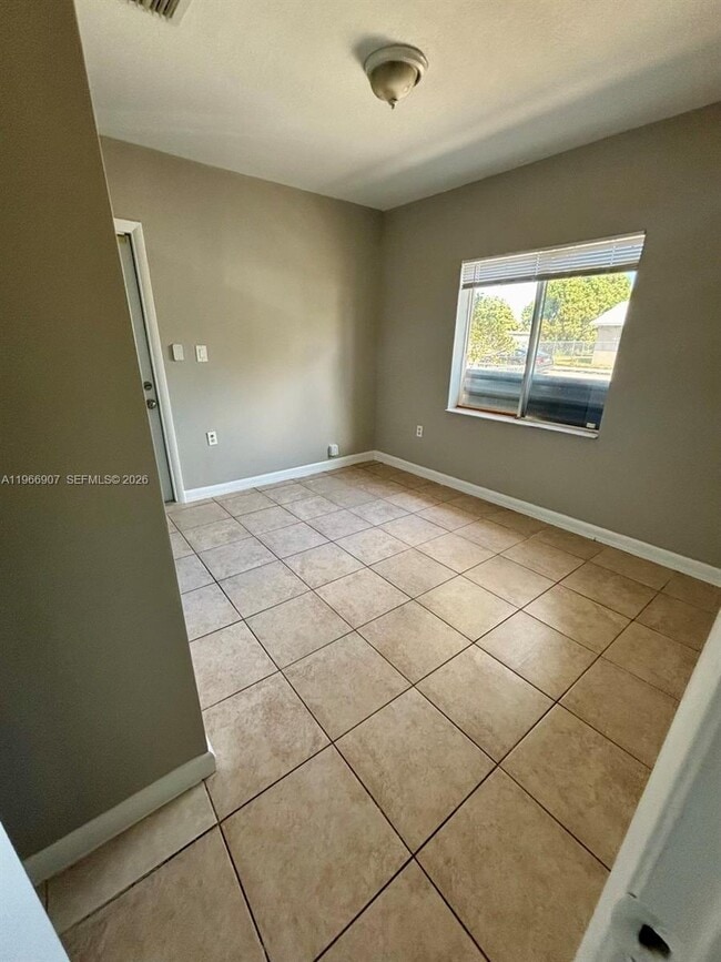 Building Photo - 1205 NW 7th Ave