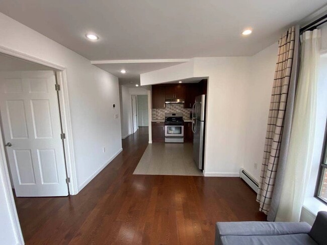 Livingroom facing Kitchen - 9411 65th Rd