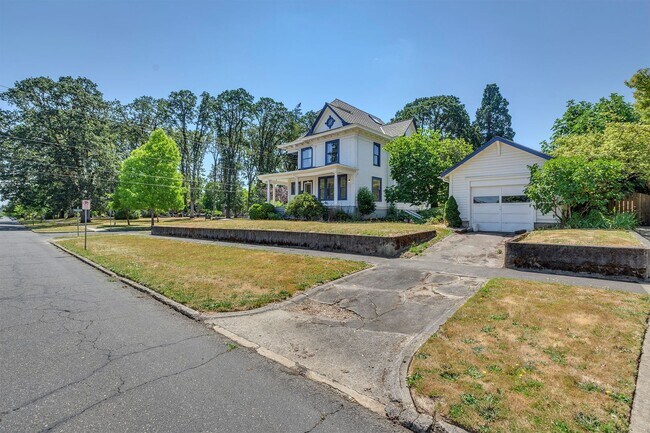 Building Photo - Historic Elegance Meets Modern Comfort – Beautifully Restored 1904 Victorian in the Heart of Fore...