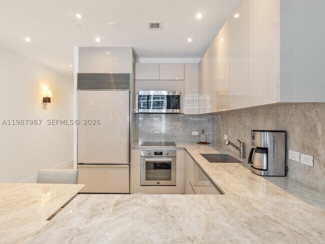 Building Photo - 6799 Collins Ave