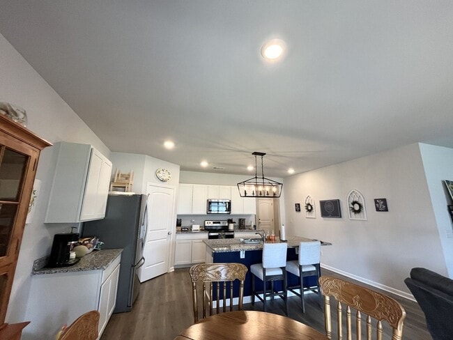 Building Photo - 4-Bedroom w/ Open Layout & Community Perks