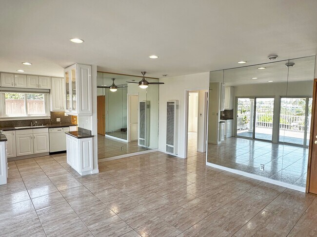 Living room to kitchen - 7410 Earldom Ave