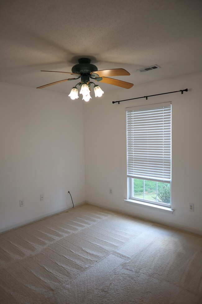 2nd Bedroom. There is a closet with folding doors. - 11 Madera Trl