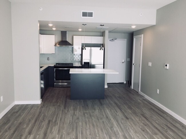 Building Photo - Rare Living Opening at Talbach Condominiums