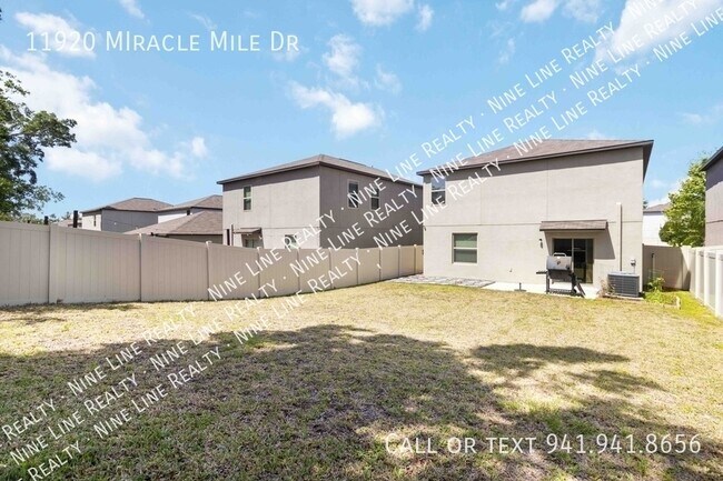 Building Photo - 11920 MIracle Mile Dr-