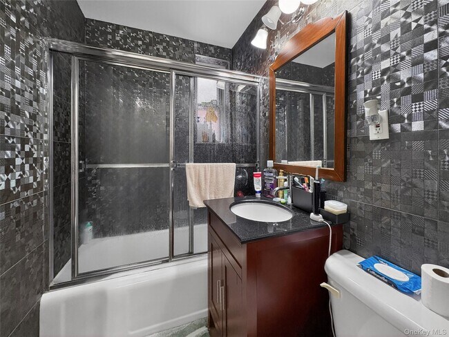 Building Photo - 105-24 63rd Dr