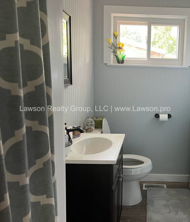 Building Photo - Charming Brick Ranch with Beautifully Land...