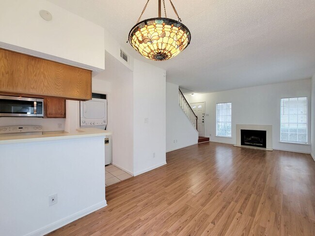 Building Photo - Beautiful two-story corner unit filled with natural light!