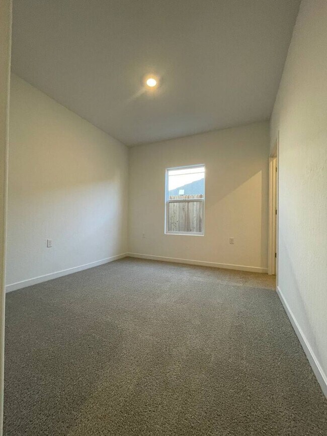 Building Photo - Move-In Special: $500 Off & Solar Savings in This Charming 4-Bedroom Home!