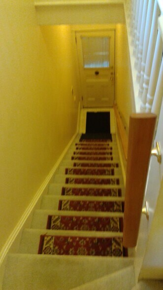 Staired entryway looking downward - 131 SW Hooker St
