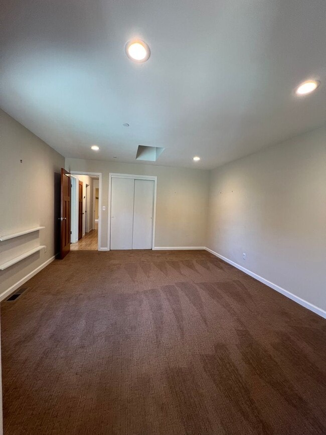 Building Photo - Spacious 4-Bedroom Retreat Just Steps from...