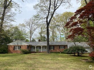 Building Photo - Rambling Brick Rancher with water views cl...