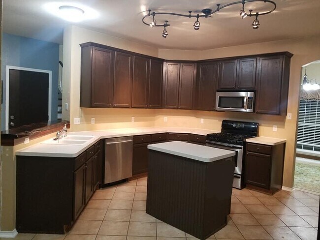 Building Photo - 5727 Woodmoss Ln