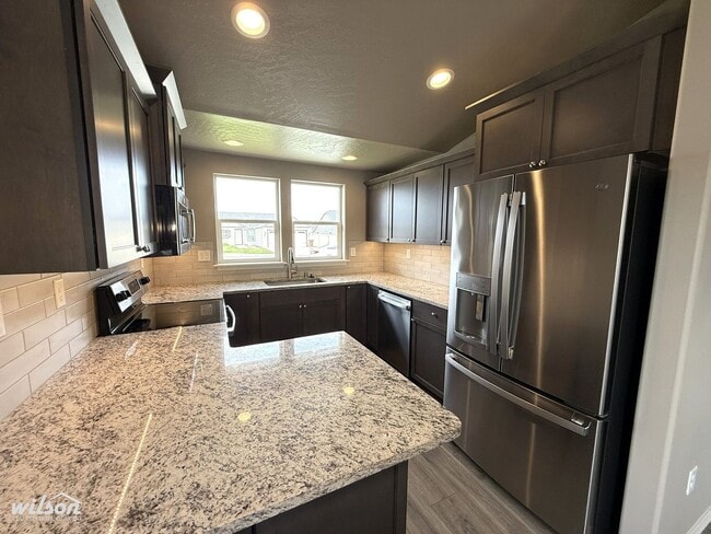 Building Photo - 3bd/2ba House in West Valley with Central AC, Fully Fenced Yard and Two Car Garage!