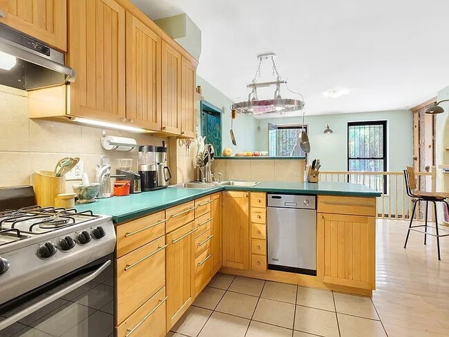 Building Photo - Charming 1-Bedroom Gem on Madison St-  Solar powered house full of character, charm and original ...