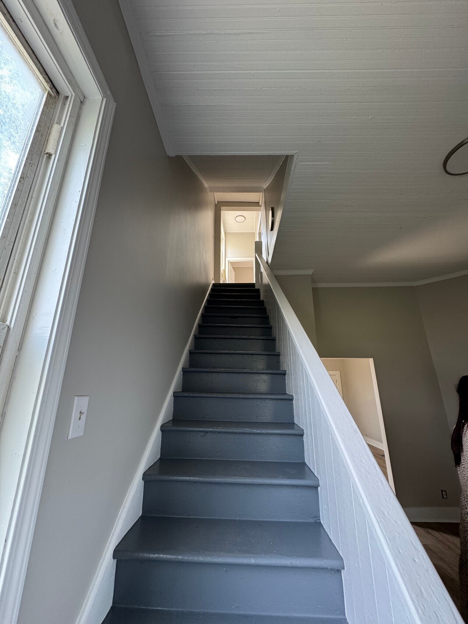 Stairs in kitchen that lead to bedrooms upstairs - 712 Maryland St