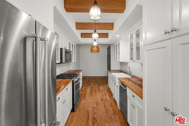 Building Photo - 10671 Holman Ave